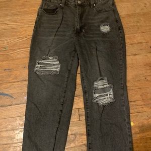 Woman’s ripped jeans